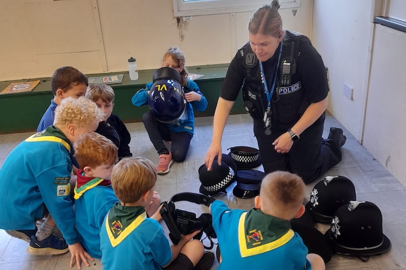 Beavers with police officer